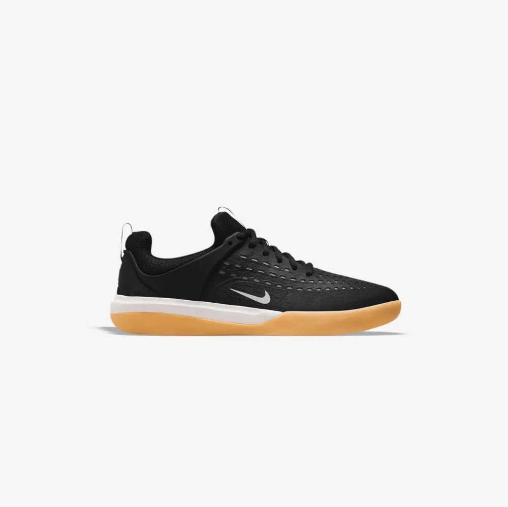 کتونی اورجینال برند Nike مدل SB Zoom Nyjah 3 رنگ مشکی و سفید از نمای بغل