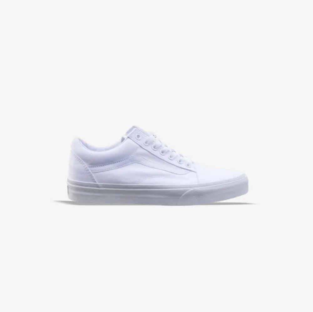 کتونی اورجینال برند Vans مدل Old Skool رنگ سفید از نمای بغل