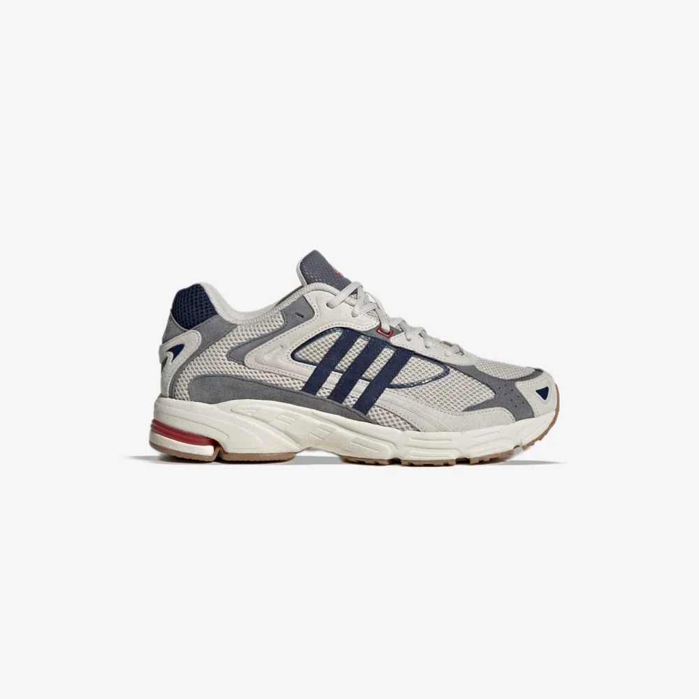 کتونی اورجینال برند Adidas مدل Response CL رنگ سرمه ای و طوسی نمای بغل